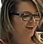 Image of wanted female subject with glasses