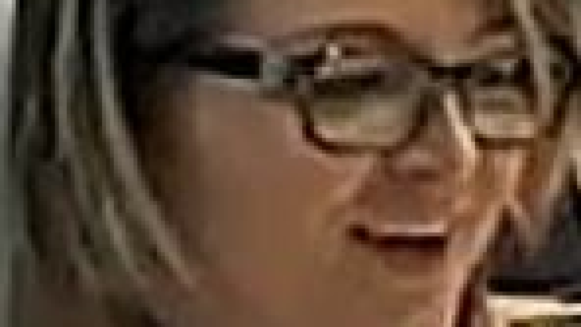 Image of wanted female subject with glasses