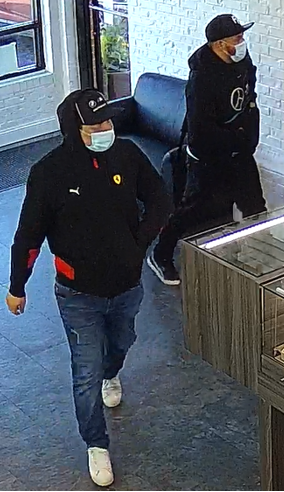 Robbers walking in store